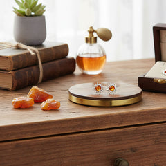 Aurinko hopeakorvakorut meripihkalla pöytä