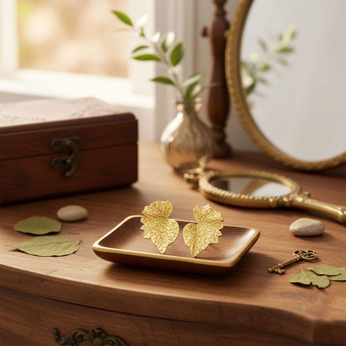 Gold-plated silver leaf earrings