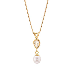 Kultainen helmikaulakoru kirkkaalla kivellä